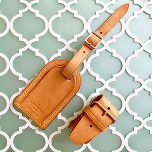 AUTHENTIC Louis Vuitton luggage & poignet set